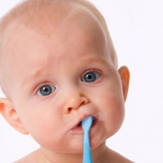 Baby brushing teeth and oral hygiene care